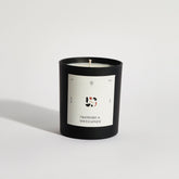 Boujie cranberry and spiced ginger jar candle, handmade with natural soy wax in a black jar – front view.